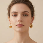 Adya Elegant Golden Teardrop Statement Earrings for Women