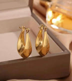 Adya Elegant Golden Teardrop Statement Earrings for Women