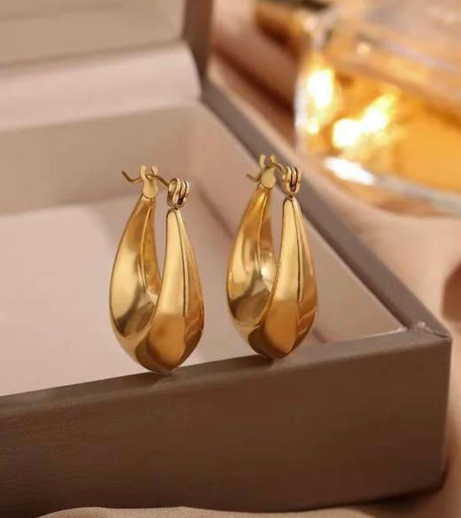 Adya Elegant Golden Teardrop Statement Earrings for Women