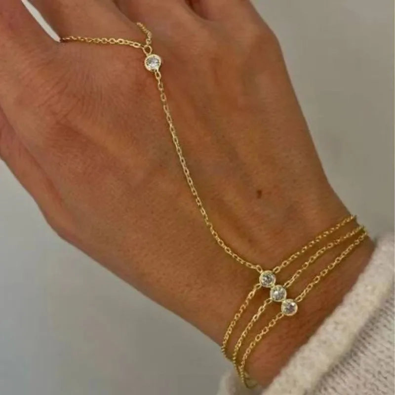 Adya Gold-Plated Crystal Hand Chain Bracelet for Women