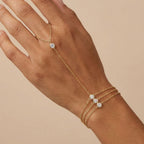 Adya Gold-Plated Crystal Hand Chain Bracelet for Women